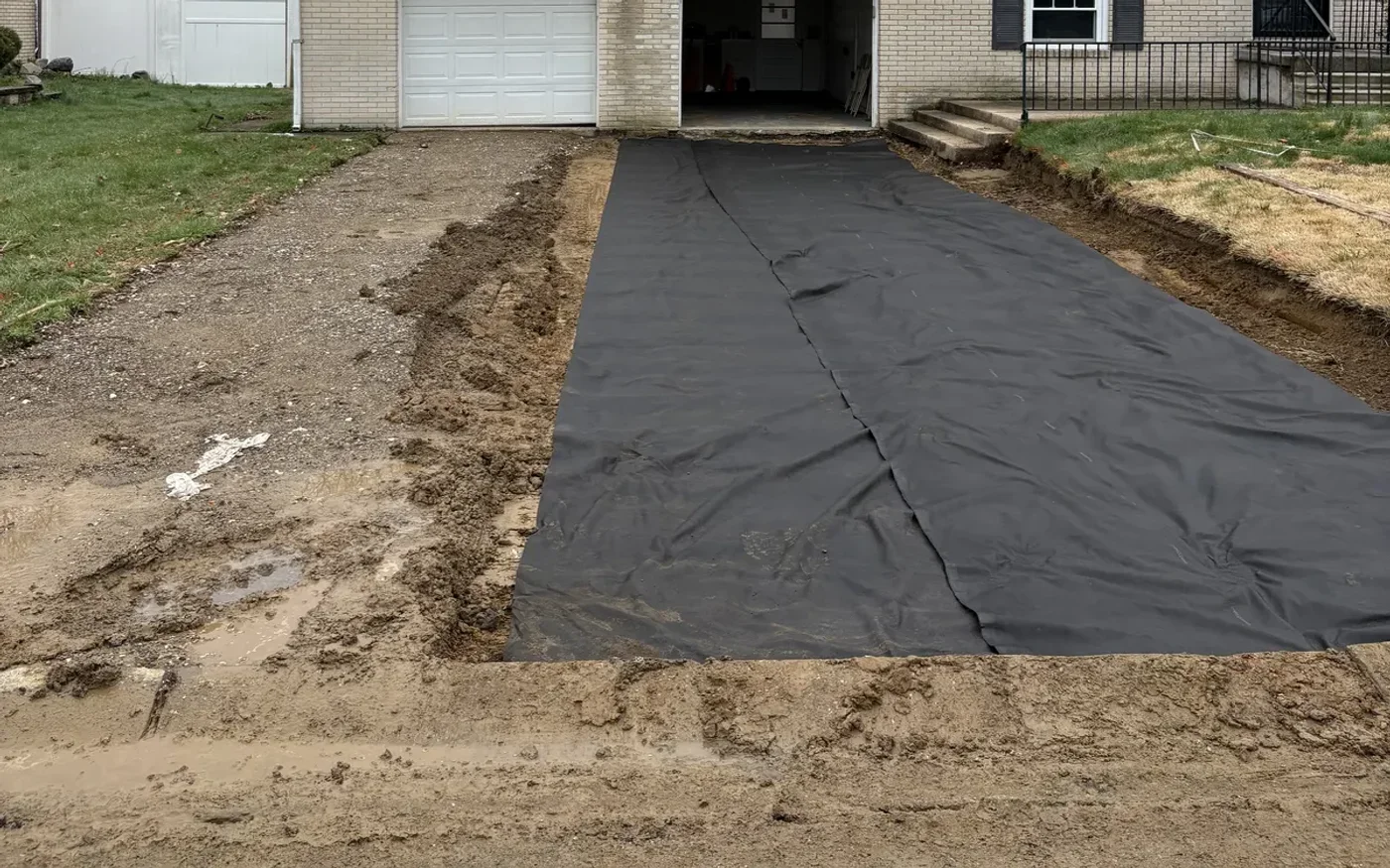 Driveway before paving — fabric and grading